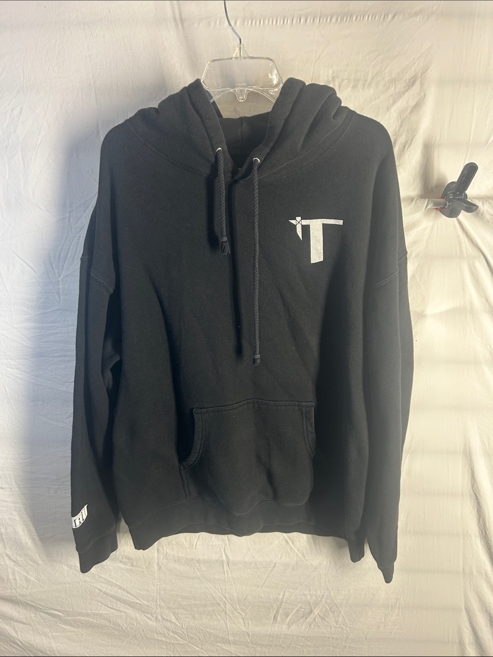 Black Pullover Hoodie with White 'T' Accent